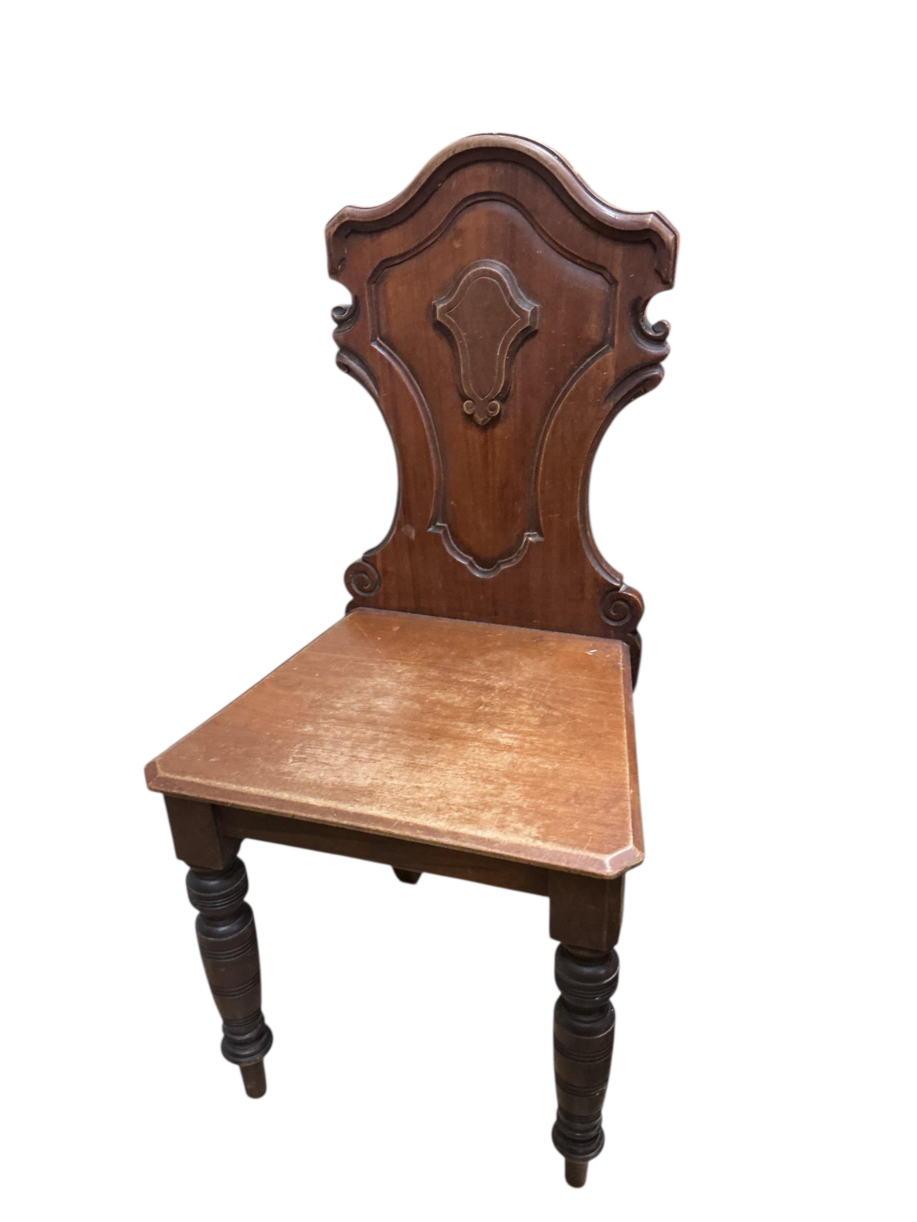 Three (two plus one) Victorian mahogany hall chairs, larger width 43cm, height 90cm